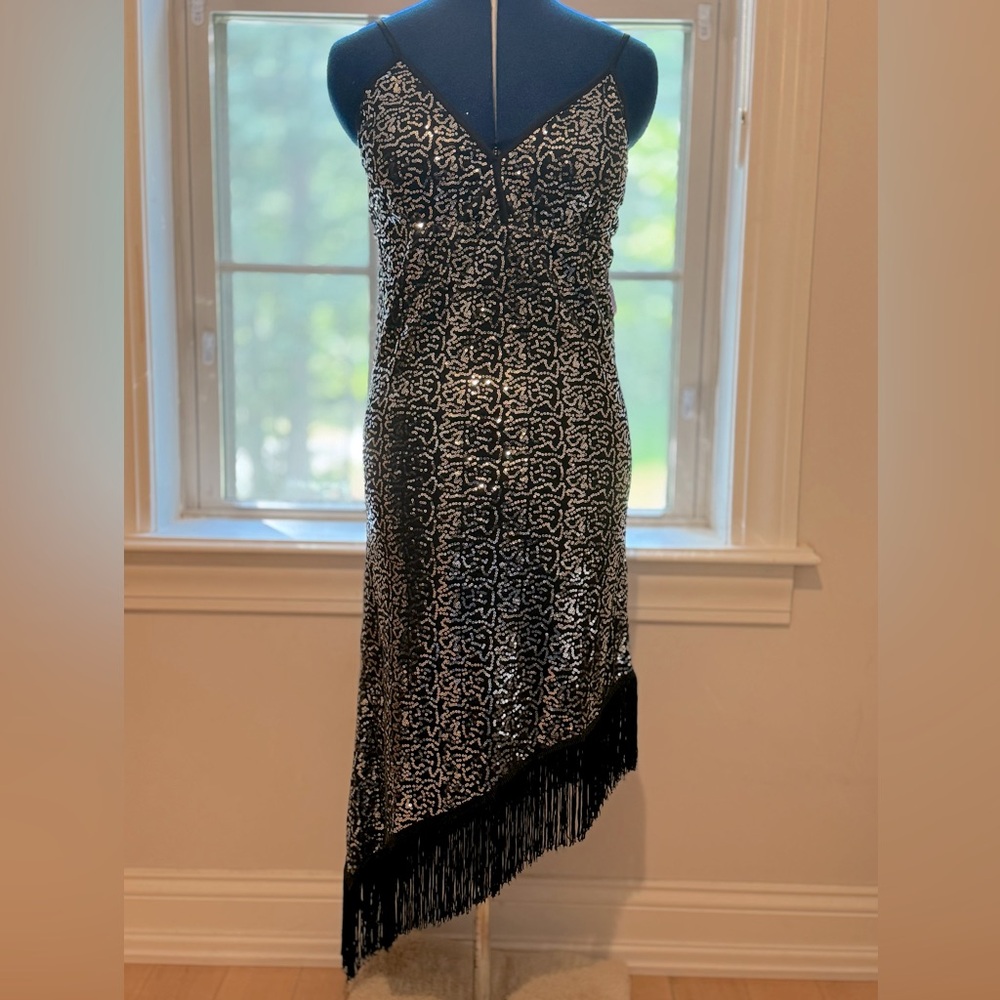 NWT black sequined flapper dress with tassels.